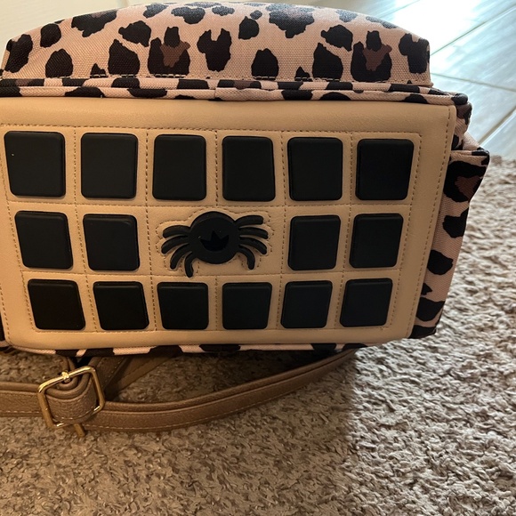 Itzy ritzy mini leopard diaper bag with pacifier holder, hand sanitizer holder - Picture 8 of 10